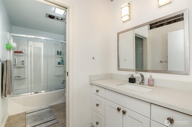 1507 Western Ave Unit R203, Seattle, WA 98101 - bathroom featuring vanity and shower / bath combination with glass door