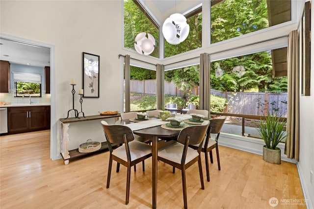 2109 130th Pl SE, Bellevue, WA 98005 - dining area with light wood-style floors and a high ceiling