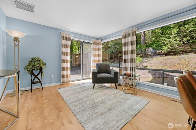 2109 130th Pl SE, Bellevue, WA 98005 - living area featuring baseboards and wood finished floors
