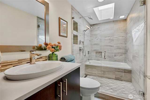 2109 130th Pl SE, Bellevue, WA 98005 - bathroom featuring vanity, tiled shower / bath combo, and a skylight