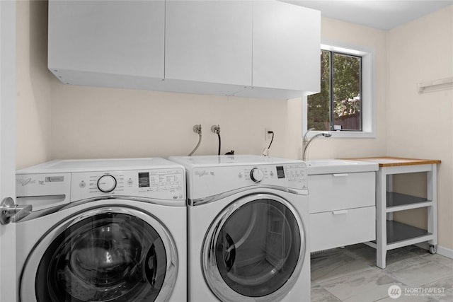 2109 130th Pl SE, Bellevue, WA 98005 - laundry area featuring washer and clothes dryer and cabinet space