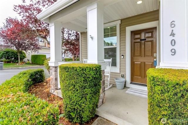 6409 Francis Ave SE, Auburn, WA 98092 - view of exterior entry featuring a porch