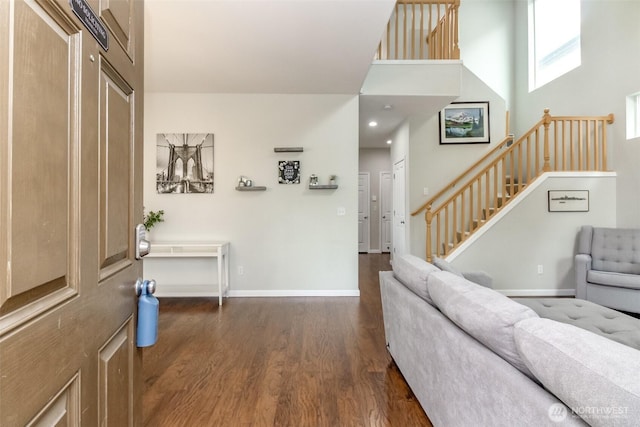 6409 Francis Ave SE, Auburn, WA 98092 - foyer with dark wood-style flooring, stairway, and a towering ceiling