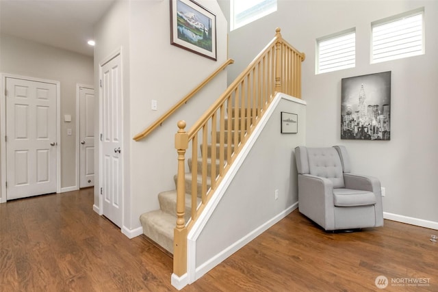 6409 Francis Ave SE, Auburn, WA 98092 - stairway featuring wood finished floors and a high ceiling