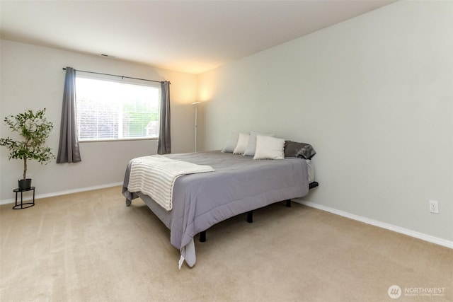 6409 Francis Ave SE, Auburn, WA 98092 - bedroom featuring light colored carpet and baseboards