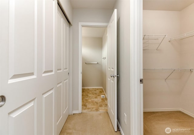 6409 Francis Ave SE, Auburn, WA 98092 - walk in closet with light colored carpet