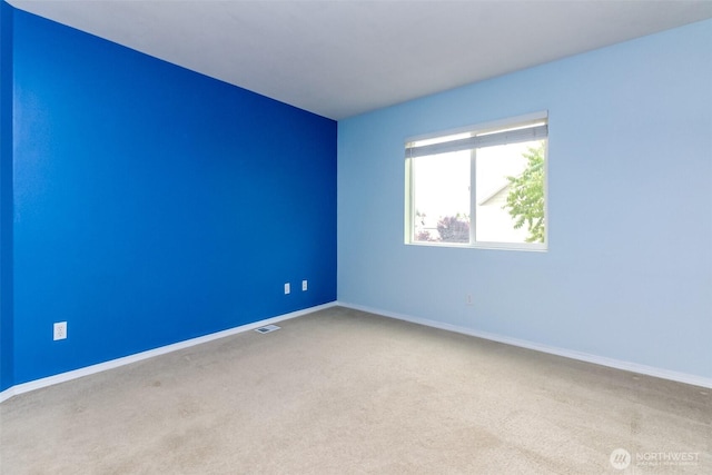 6409 Francis Ave SE, Auburn, WA 98092 - unfurnished room featuring carpet and baseboards