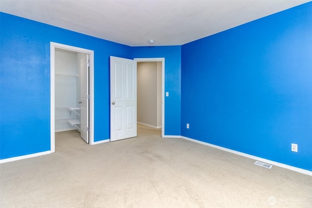 6409 Francis Ave SE, Auburn, WA 98092 - unfurnished bedroom featuring carpet and a spacious closet