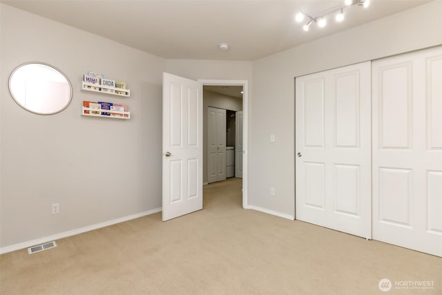 6409 Francis Ave SE, Auburn, WA 98092 - unfurnished bedroom with light colored carpet and a closet