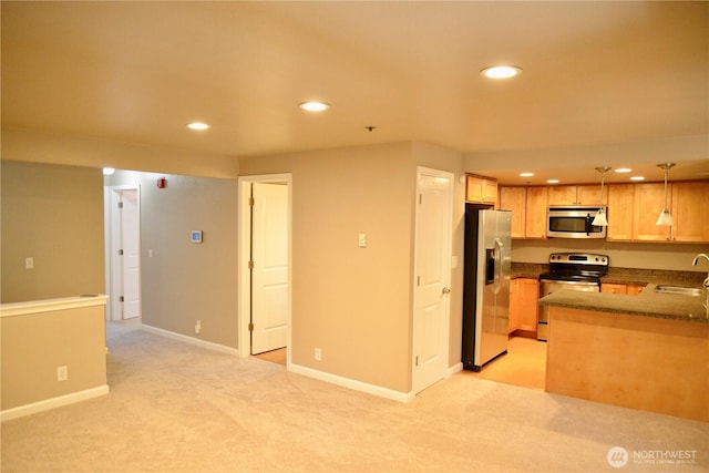 1626 Grant Ave S Unit E202, Renton, WA 98055 - kitchen with appliances with stainless steel finishes, recessed lighting, light colored carpet, pendant lighting, and light brown cabinets