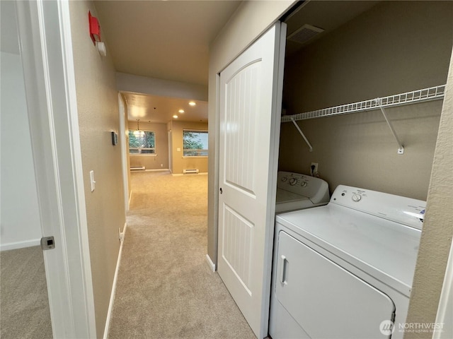 1626 Grant Ave S Unit E202, Renton, WA 98055 - washroom featuring light colored carpet and washer and dryer