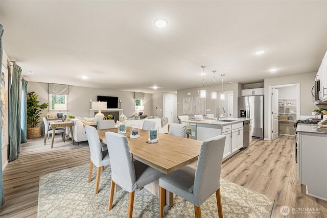 2926 6th Ave NE Unit 25, Olympia, WA 98506 - dining space with light wood-style floors and recessed lighting