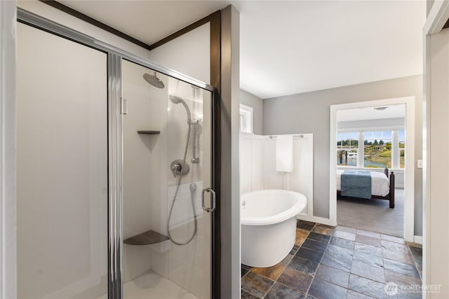 882 Shoshone Dr, La Conner, WA 98257 - ensuite bathroom featuring stone tile floors, a freestanding tub, a shower stall, and a water view