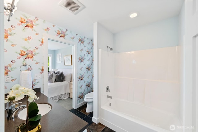 882 Shoshone Dr, La Conner, WA 98257 - full bath featuring shower / bath combination, wallpapered walls, ensuite bath, vanity, and tile patterned floors