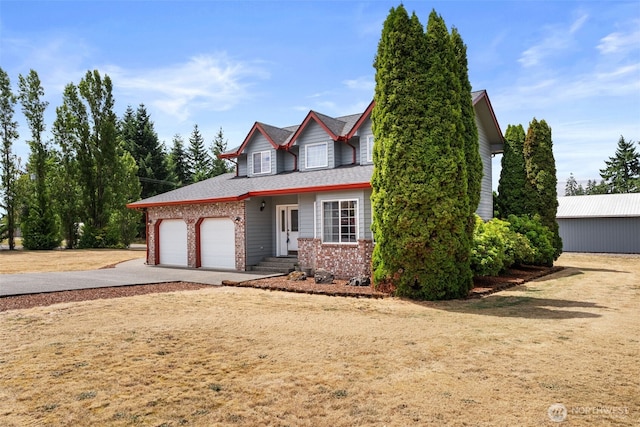 105 Clearview Cir, Chehalis, WA 98532 - traditional-style home featuring concrete driveway, an attached garage, and brick siding