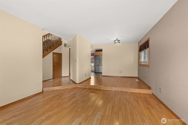105 Clearview Cir, Chehalis, WA 98532 - unfurnished living room with light wood-style floors and stairway