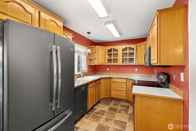 105 Clearview Cir, Chehalis, WA 98532 - kitchen featuring stainless steel appliances, stone finish floors, light countertops, glass insert cabinets, and pendant lighting