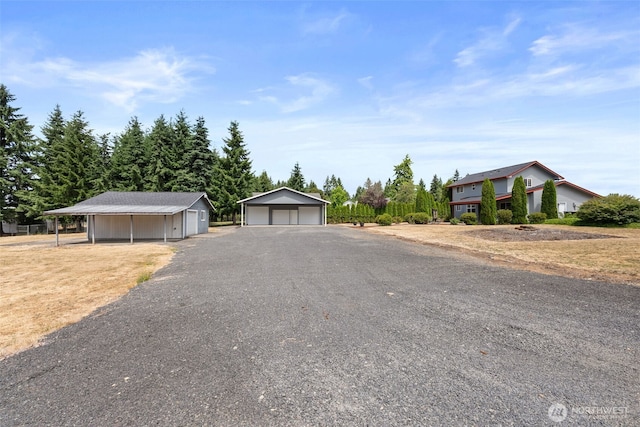 105 Clearview Cir, Chehalis, WA 98532 - view of front of home featuring a garage, an outdoor structure, and a carport
