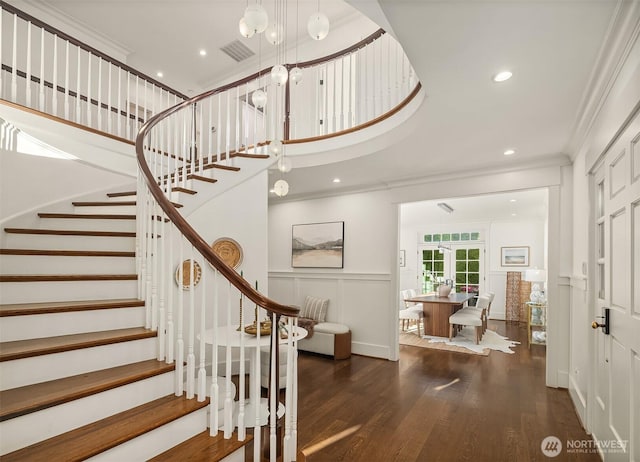 3202 Hunter Blvd S, Seattle, WA 98144 - entryway with a decorative wall, ornamental molding, stairway, wood finished floors, and recessed lighting