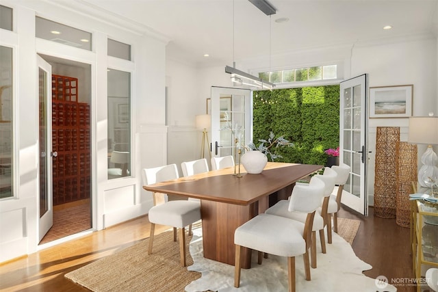 3202 Hunter Blvd S, Seattle, WA 98144 - dining area featuring french doors, wood finished floors, crown molding, and recessed lighting
