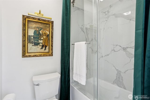 2233 2nd Ave W, Seattle, WA 98119 - bathroom featuring bath / shower combo with glass door and toilet