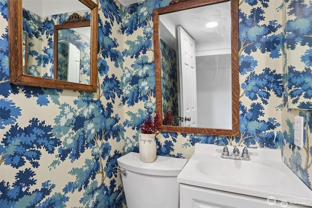 2233 2nd Ave W, Seattle, WA 98119 - bathroom featuring wallpapered walls and vanity