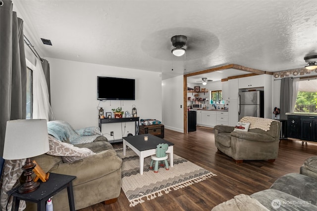 174 Skinner Rd, Chehalis, WA 98532 - living area with a ceiling fan, dark wood-style floors, and a textured ceiling