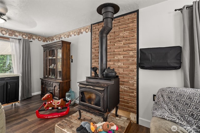 174 Skinner Rd, Chehalis, WA 98532 - living room with a wood stove and wood finished floors