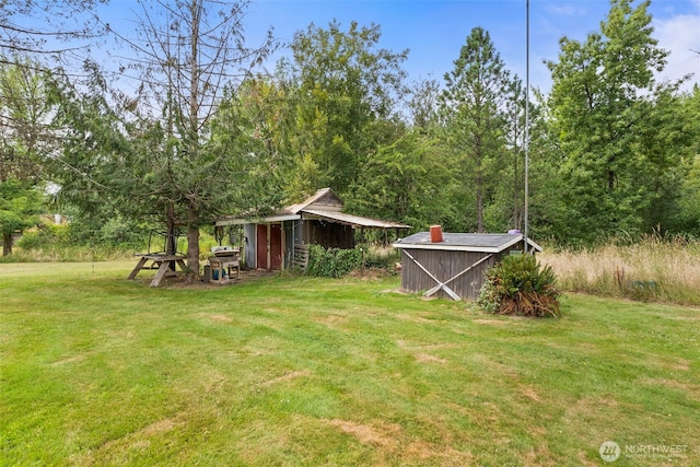 174 Skinner Rd, Chehalis, WA 98532 - view of green lawn with an outbuilding