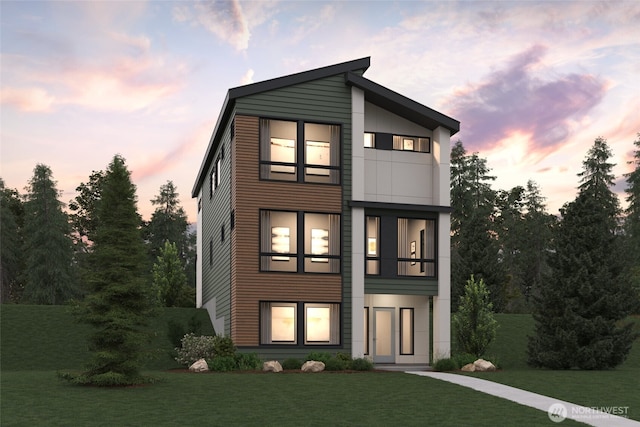 4267 Aberdeen Way NE, Renton, WA 98056 - back of house at dusk featuring a yard