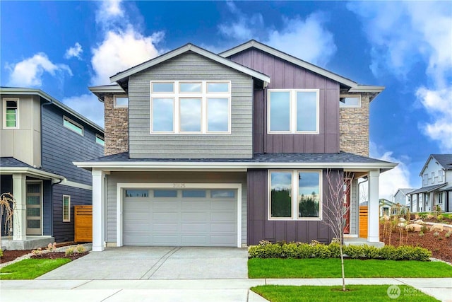 20625 153rd St E, Bonney Lake, WA 98391 - view of front facade with board and batten siding, an attached garage, driveway, and stone siding