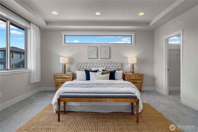 20625 153rd St E, Bonney Lake, WA 98391 - carpeted bedroom featuring multiple windows, a walk in closet, recessed lighting, and a raised ceiling