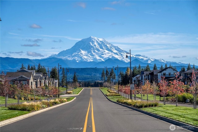 20625 153rd St E, Bonney Lake, WA 98391 - view of asphalt road with a mountain view, curbs, and a residential view