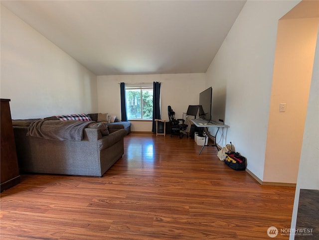 15730 91st Way SE, Yelm, WA 98597 - living room featuring wood finished floors and vaulted ceiling