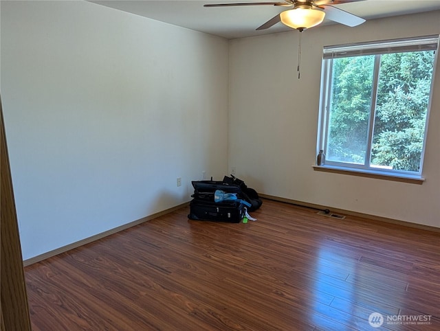 15730 91st Way SE, Yelm, WA 98597 - spare room featuring ceiling fan and wood finished floors