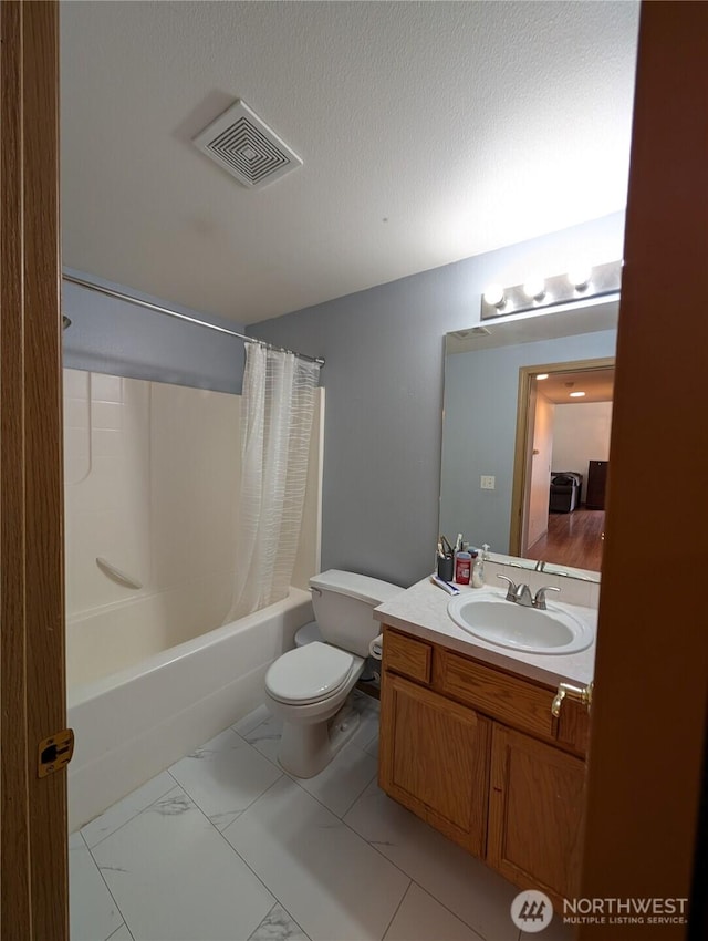15730 91st Way SE, Yelm, WA 98597 - bathroom featuring marble look tiles, shower / bath combination with curtain, and vanity