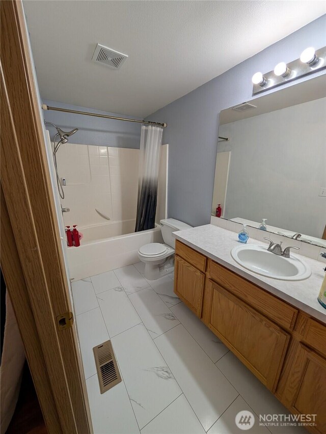 15730 91st Way SE, Yelm, WA 98597 - full bathroom featuring marble look tile flooring, shower / bath combination with curtain, and vanity
