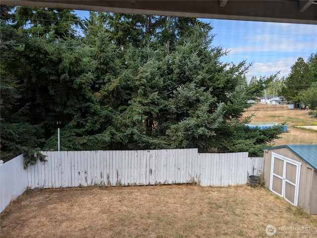 15730 91st Way SE, Yelm, WA 98597 - fenced backyard with a storage unit