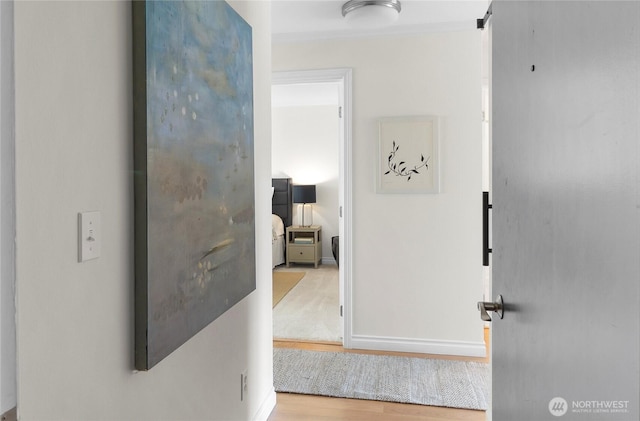 2501 Canterbury Ln E Unit 221, Seattle, WA 98112 - hall with baseboards and wood finished floors