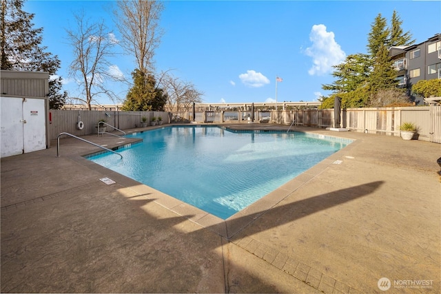 2501 Canterbury Ln E Unit 221, Seattle, WA 98112 - community pool featuring a fenced backyard and a patio