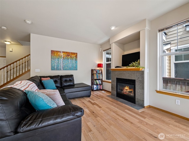 11403 SE 171st St, Renton, WA 98055 - living area with wood finished floors and a fireplace with flush hearth