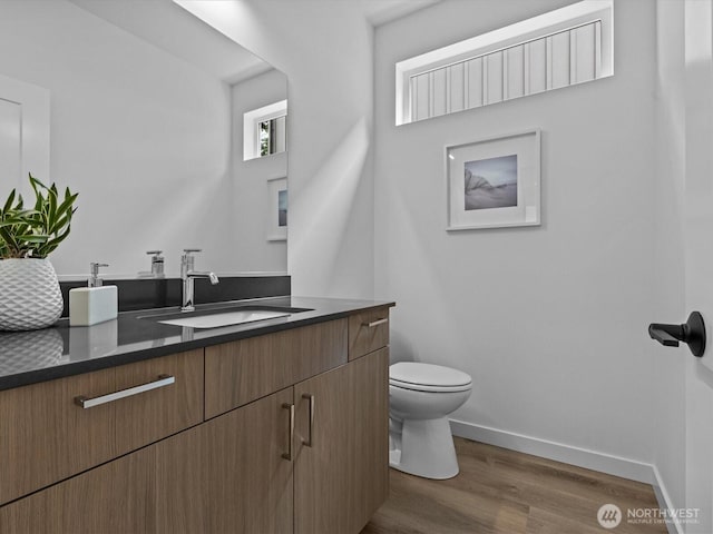 9015 Dibble Ave NW Unit B, Seattle, WA 98117 - bathroom with vanity and wood finished floors