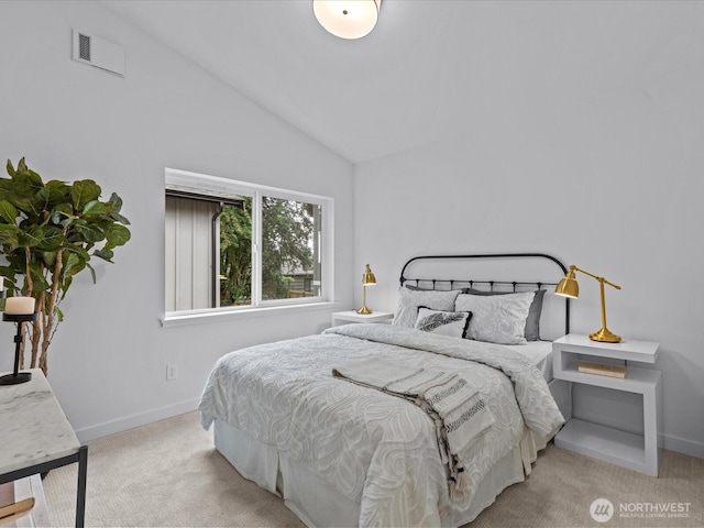 9015 Dibble Ave NW Unit B, Seattle, WA 98117 - carpeted bedroom featuring vaulted ceiling and baseboards