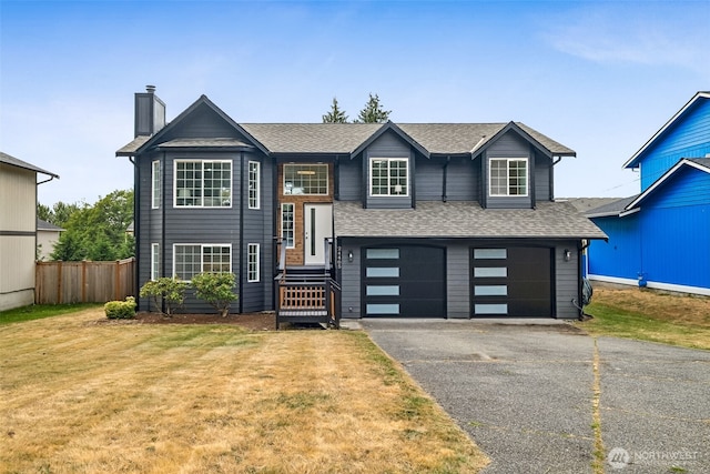 24405 24th Ave S, Des Moines, WA 98198 - raised ranch with driveway, a garage, a chimney, and roof with shingles