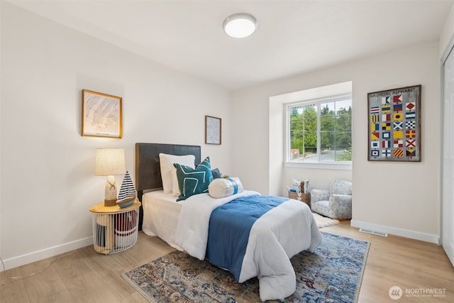 24405 24th Ave S, Des Moines, WA 98198 - bedroom featuring light wood-style flooring