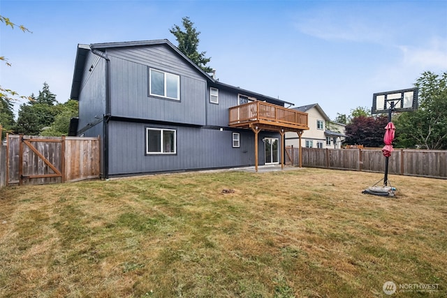 24405 24th Ave S, Des Moines, WA 98198 - rear view of property featuring a fenced backyard and a wooden deck