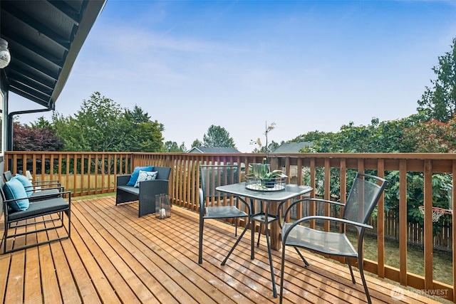 24405 24th Ave S, Des Moines, WA 98198 - wooden terrace with outdoor dining space and outdoor lounge area