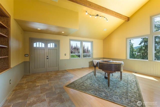 822 E Oak St, Sequim, WA 98382 - entryway with wainscoting, beam ceiling, and high vaulted ceiling