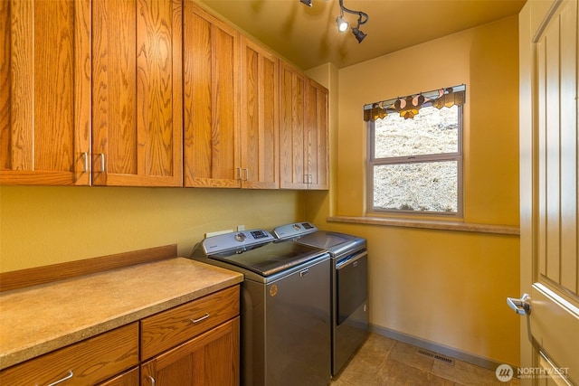 822 E Oak St, Sequim, WA 98382 - washroom with cabinet space and independent washer and dryer