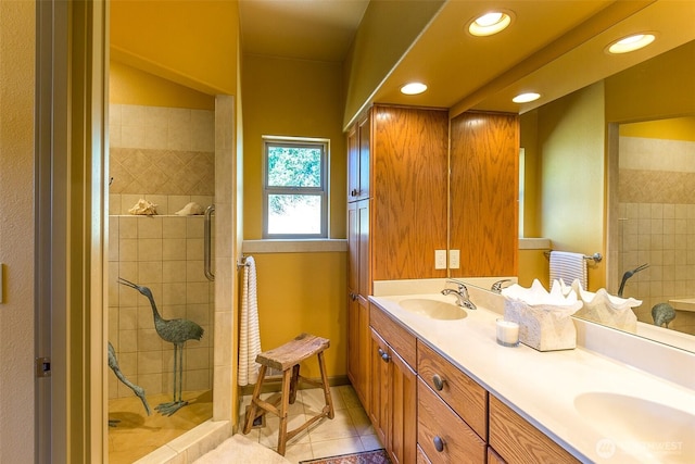 822 E Oak St, Sequim, WA 98382 - full bathroom featuring double vanity, tile patterned floors, a tile shower, and recessed lighting